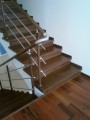 Деревянная лестница из металлического каркаса + тонированный бук + нержавеющая сталь + гипсокартон с покраской 